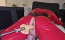 Hooded June: Red Enclosed Doll Fucks Itself with Fuckmachine