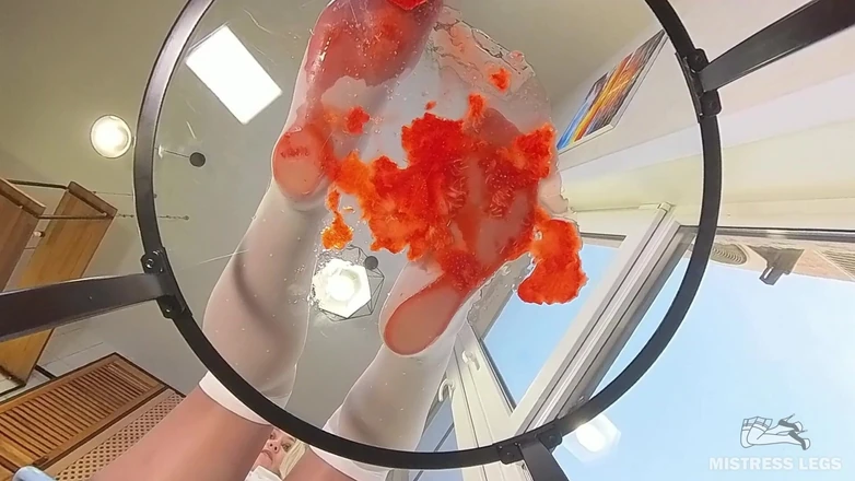 Mistress Legs: My Nylon Feet Squeezing Strawberry Juice on a Glass Table