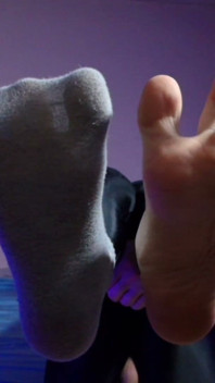 Puppy Keeps Teasing You with His Socks and Bare Paws