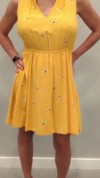 Stella in a Yellow Sun Dress with Black Heels