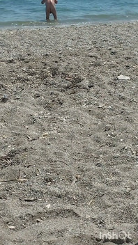 Am Strand Nackt Genießend