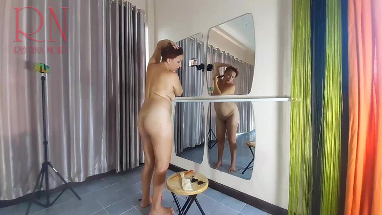 Regina Noir: Naked nudist hairdresser. She cuts her own hair. Regina Noir...