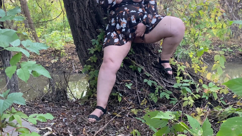Elena: Lustful MILF in a short dress caresses herself to orgasm...