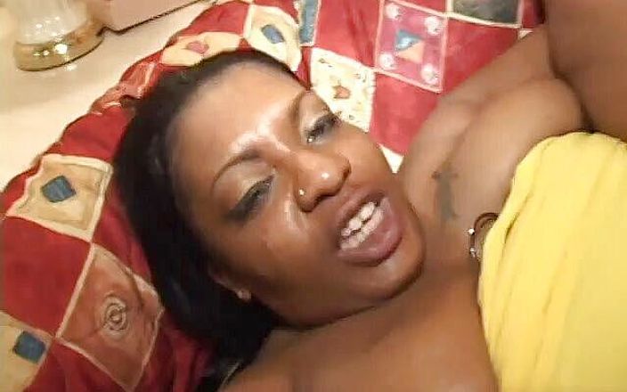Hot and Wet: Black man fucks women doggy style on a red couch