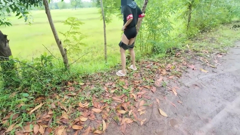 RealThaiSolo: Thai Girl Walking Showing Along the Side of the Field...