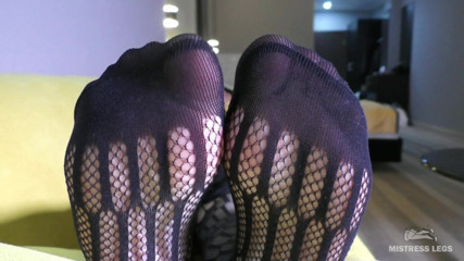 Mistress Legs: Toes wiggling in black mesh bodysuit