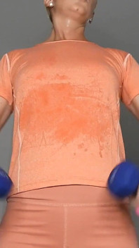 Dripping Sweat in Tight Orange Leggings