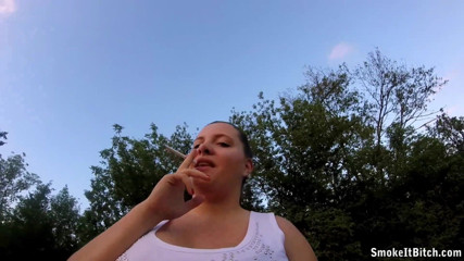 Smoke it bitch: Brunette chick Rose smokes her cigarette outdoor in POV