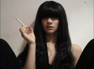 Femdom Austria: Long haired bitch smoking a cigarette