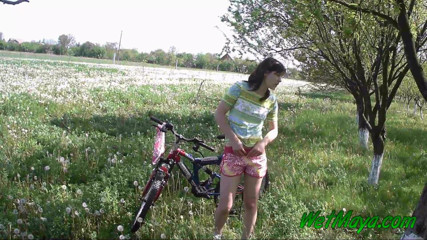 Wet Maya: Peeing on her bicycle