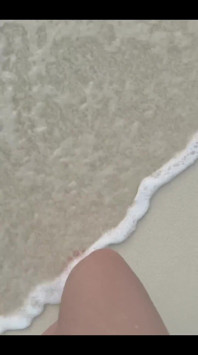 Running my bare feet on the white beach sand by the ocean.