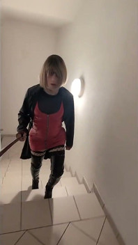 Public Walk in Parking House, Blonde in Overknee Boots, Red Pvc Dress and Long Leather Coat.