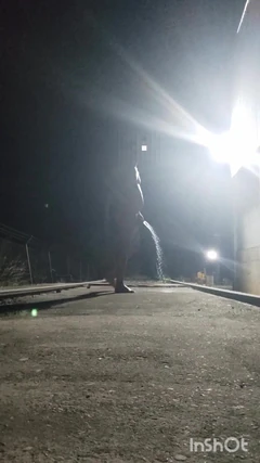 Naked and Pissing on the Train Tracks