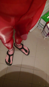 Pissing at Home in Red Legging with Penis Sleeve