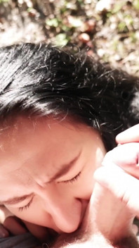 Outdoor submissive blowjob with massive cumshot on her face and eyes
