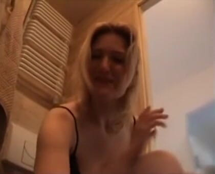 Foot Girls: Footjob wife makes him lay down in the bathroom