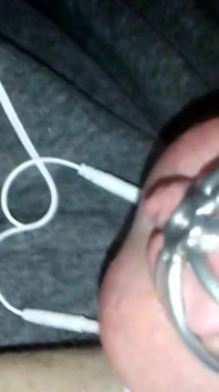 Pretty sissy Sadie caged e-stim orgasm