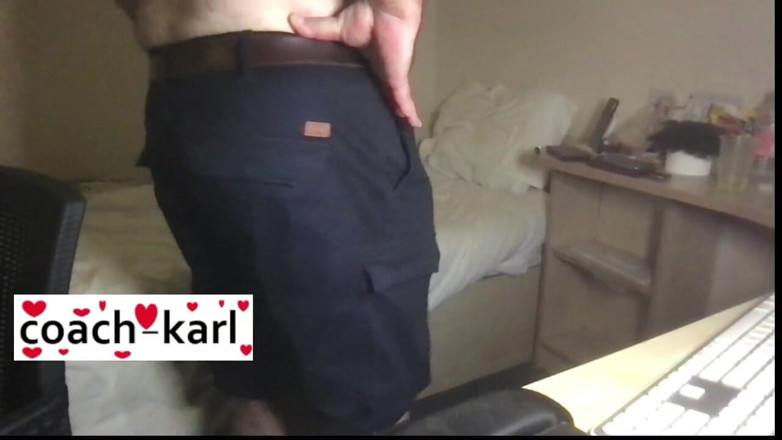Coach Karl dude lodge: Coach Karl shows off his blue shorts