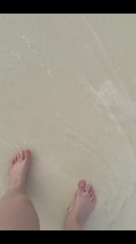 Running my bare feet on the white beach sand by the ocean.