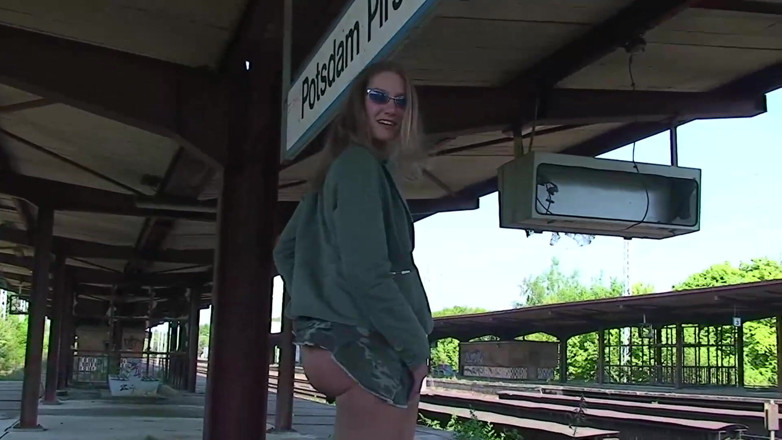 Public Entertainment: Small titted babe is spreading her legs outdoors