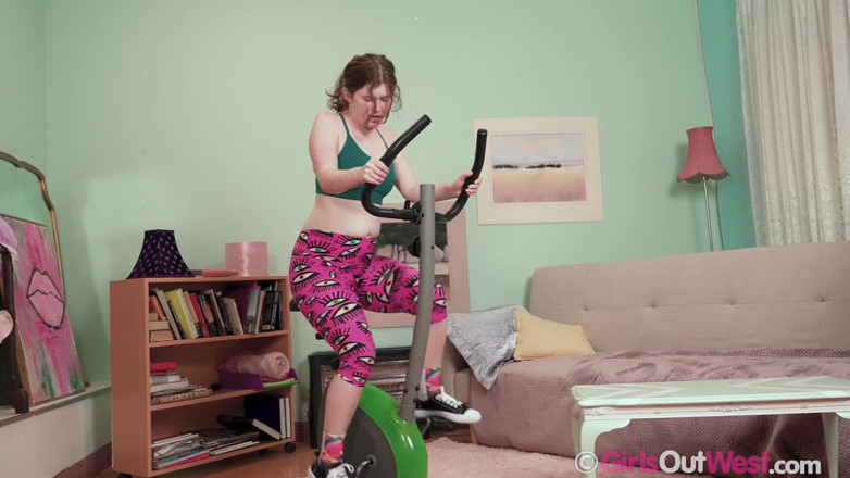 Girls Out West: Lovely hairy redhead rides spin bike and masturbates with big...