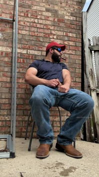 Booted Bearded Fella Cigar and Edge Out Back