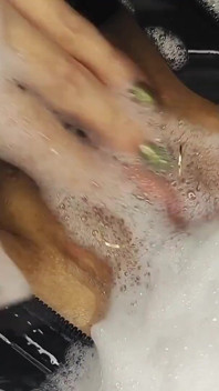 Taking a Bath in a Back Latex Catsuit