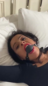 Sexy Secretary Tied up Tight, and Gagged with Cleave Gag and Then Huge Ballgag While Tied Spread Eagle on Bed!