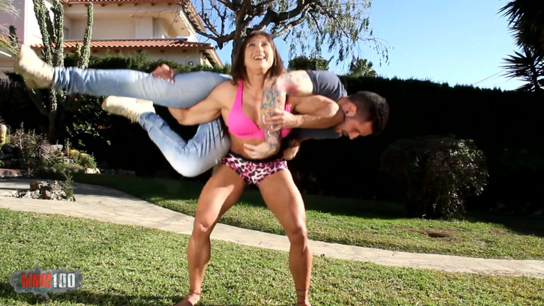 MMM100: Muscular woman holding her boytoy