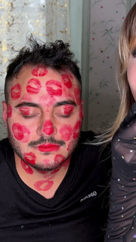 Red Lipstick Kisses Cover His Entire Face