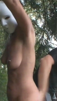 Humiliating whipping with masked girl