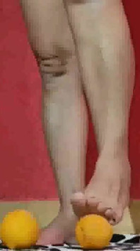 Feet, oranges and high heels