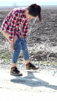 Desperate Girl with Full Bladder Has to Pee on a Dirt Road