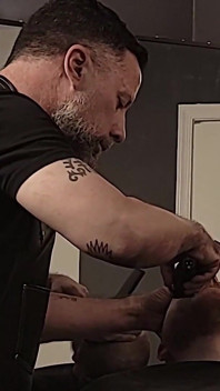 Dirty Barber Gives Bear More Than Just a Haircut!