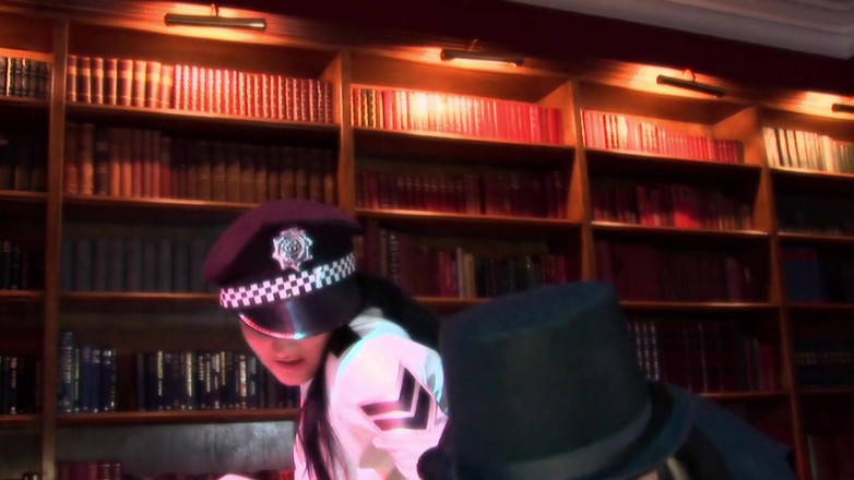 A Lesbian World: Kinky blonde shoves a stick into sexy police woman's asshole...