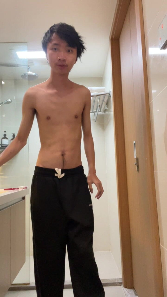 Songjiahao: Asian Skinny Boy Debugging Water Heater in Hong Kong Hotel