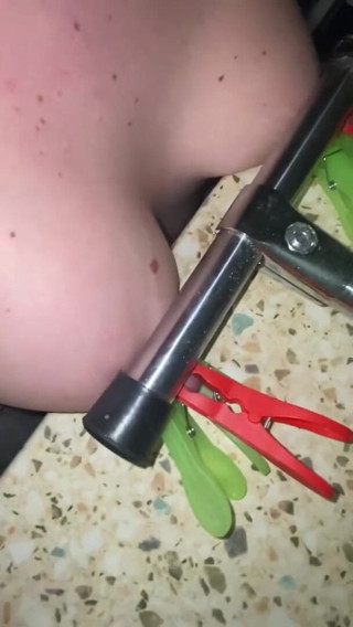 Elena917: tits with clamps and pressing - solo