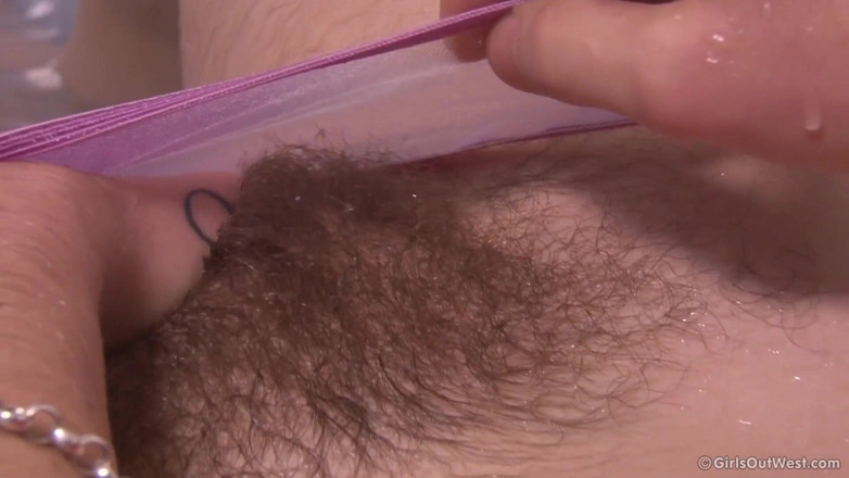 Girls Out West: Hairy brunette takes bath with clothes on and fingers her...