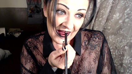 Abby Anna: Milf putting on dark red lipstick