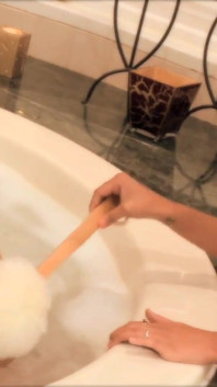 Hot bath with her favourite friend