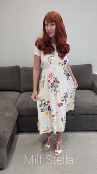 A Redhead in a Dress