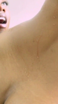 Two hot ebonies play with each other in bathroom