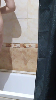 A Neighbor with Big Tits and a Big Ass Takes a Bath and Shaves Her Pussy