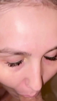Stepmom Tries to Take It All in Her Mouth While Sitting in the Shower