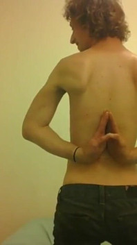 Topless Transgirl Surprised at Her Own Flexibility