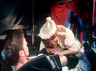 Fetish World: Redhead fucking a man in the back of a wagon