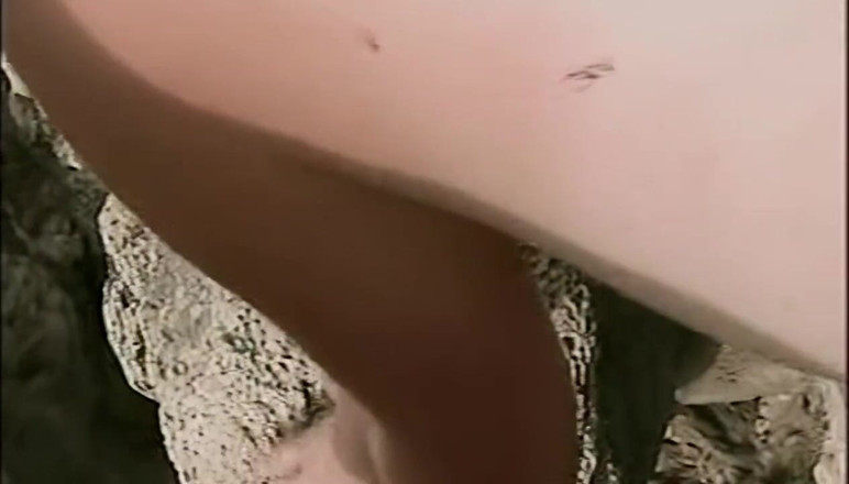 Vintage Fetish: Horny Redhead Babe Fingers Pussy on Wild Beach