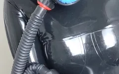 Wolki in Latex and Gas Mask