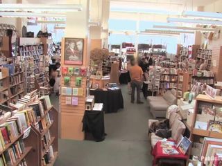Public Disgrace by Kink: Roodharige boekenwurm wordt vernederd en geneukt in een boekwinkel!