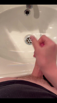Masturbating